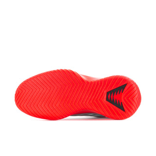 Red rubber outsole with multidirectional traction tread and black logo mark