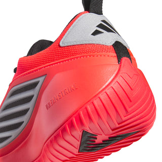 Close-up of red side and sole with gray graphics and tread pattern