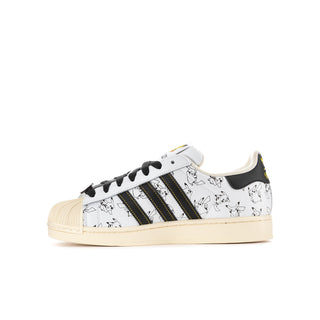 Youth white low-top sneaker angled view with black laces and adidas stripe accents