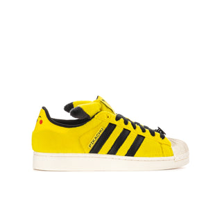Youth yellow sneaker with black triple stripes, plush ear hood, and lace-up
