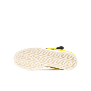 Youth sneaker outsole with zigzag tread pattern and yellow upper edge