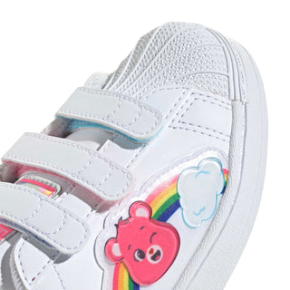 Kids' white side panel sneaker with rainbow and Care Bears bear patch graphic