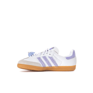 Kids' white low-top sneakers with purple side stripes and gum sole
