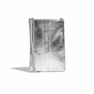 Metallic silver flat crossbody bag front view with drawstring closure