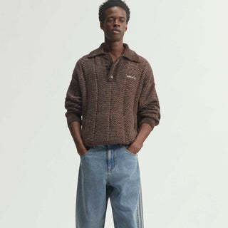 Mens light blue denim pants with belt loops, front fly, and straight wide leg