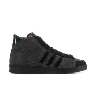 Men's black high-top sneakers with adidas stripes and orange lace accents