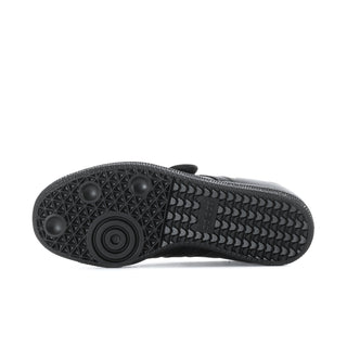 Black rubber outsole with textured tread pattern and circular grip detail
