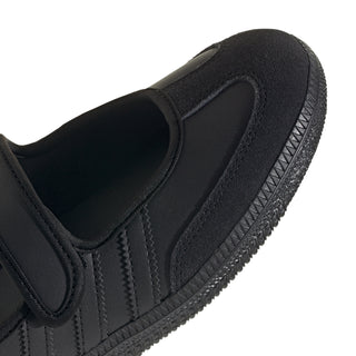 Close-up of black Mary Jane upper with panel seams and padded interior
