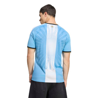 Back view of light blue and white striped soccer jersey with black collar trim