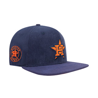 Navy baseball cap with orange Astros logo and circular Astros team patch