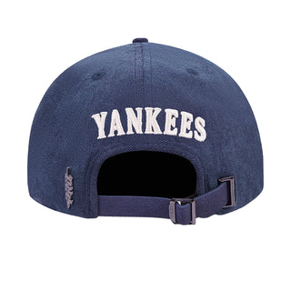 Navy Yankees strapback cap with “YANKEES” embroidery on the back and adjustable strap