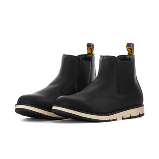 Pair of men's black Chelsea boots with elastic gore and beige-and-black rugged outsole.