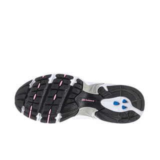 Outsole view of white and pink 530 running shoes with grippy tread