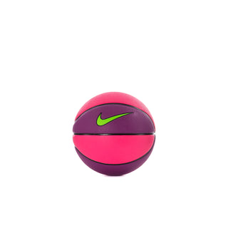 Mini basketball in pink and purple with green Nike swoosh and black seam
