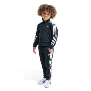 Kids black track set with zip-front jacket and white triple stripe pants.