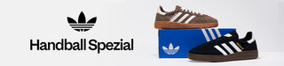 Adidas handball spezial shoes with packaging and logo on a white background