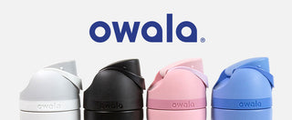 white, black, pink and light blue owala water bottles