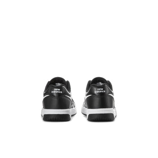 Kids' New Balance sneakers, black and white, rear view with heel logos
