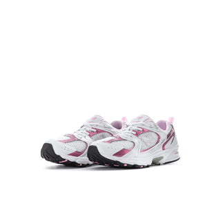 Kids running shoes front side view, white mesh with pink overlays and laces