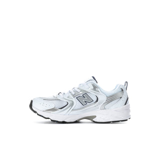 Kids' New Balance 530 sneakers in white with navy accents, lace-up design