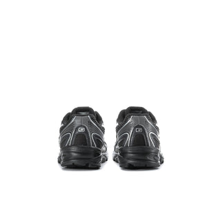 Kids black sneakers back view with heel tab, lace-up closure, and cushioned sole