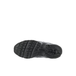 Kids black sneaker outsole with textured tread and molded traction pattern