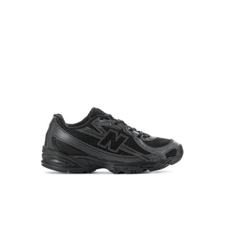 Kids' black running shoe with N logo, side venting, and rubber toe bumper