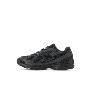 Kids' black running shoe with N logo, textured overlays, and lace-up upper