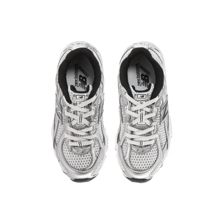 Kids silver metallic sneakers with patterned mesh uppers, gray laces, and black collar