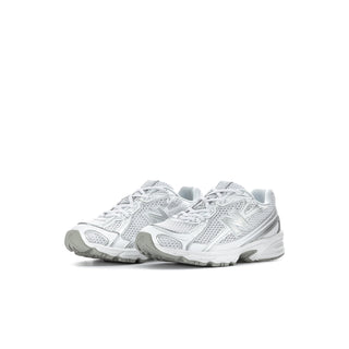Kids white and silver metallic running sneakers with cushioned midsole, side view