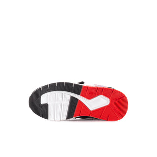 Kids sneaker outsole with white tread and red sidewall grip