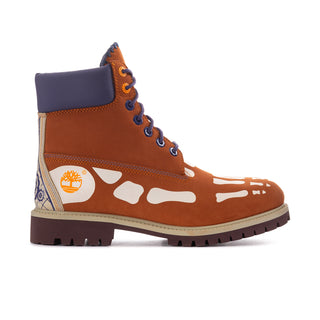 Men's brown and indigo lace-up boot with white splash graphic and padded collar.