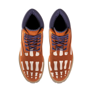 Men's brown lace-up boots with indigo lining and white splash pattern on the toe.