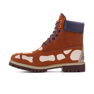 Men's brown and indigo lace-up boot with white splash design and cushioned ankle collar.