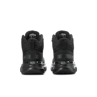 Black mid-top work boots rear view, elastic panels and Timberland Pro heel pull tabs