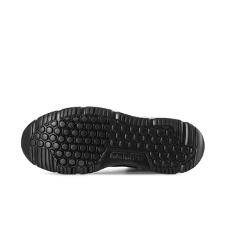 Black rubber outsole with deep hex-pattern tread for work boots