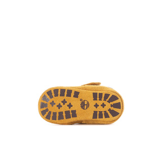 Infant wheat bootie outsole with textured pattern and dark border
