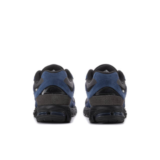 Men's 2002R sneakers, rear view with black heel and dark blue side panels