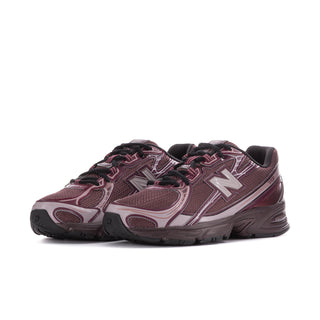 Women’s running shoes, side-by-side view, burgundy mesh with white logo and laces