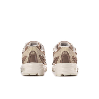 Women's sneakers with beige-brown heel counter and white midsole, back view.