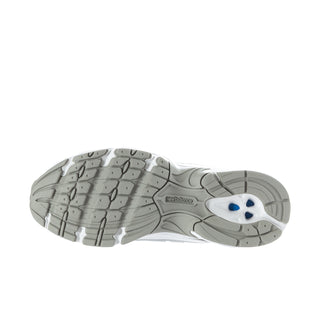 White athletic sneaker outsole with gray tread and blue accent logo, bottom view