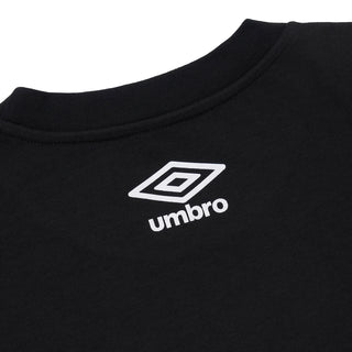 Close-up of black T-shirt collar with white Umbro logo print