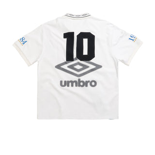 White polo shirt back with large number 10 and Umbro logo beneath