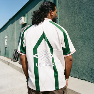Men's off-white back jersey with Umbro logo and vertical green stripe