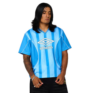 Men's blue striped soccer jersey with V-neck and Umbro crest, worn front view
