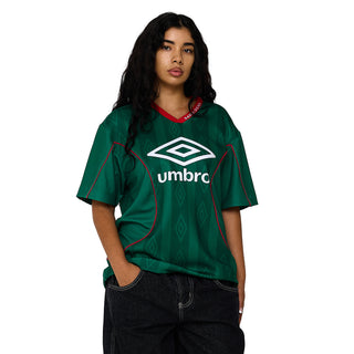 Men's green soccer jersey with Umbro logo and red collar trim