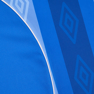 Blue jersey fabric close-up with white edge trim and geometric pattern