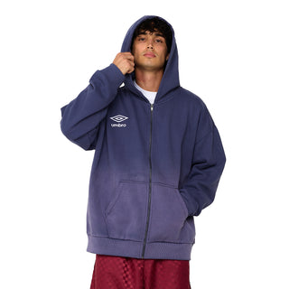 Mens dark blue zip-front hoodie with hood and Umbro logo; hands in pocket