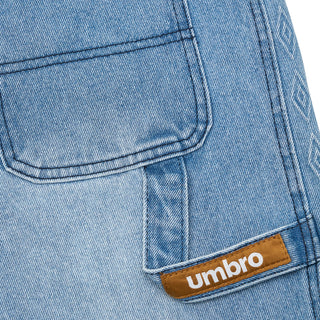 Light blue denim carpenter shorts with button fly and Umbro logo patch