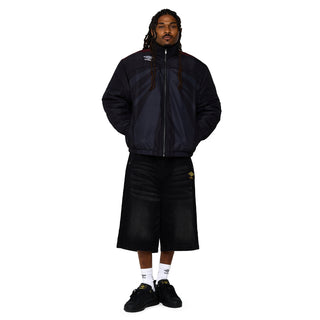 Men's black denim carpenter shorts with Umbro logo patch, worn with white socks